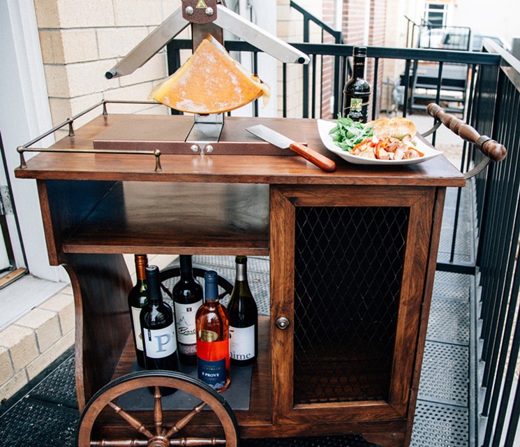 Tableside raclette service will be a big part of the menu. - COURTESY OF SOLUTIONS