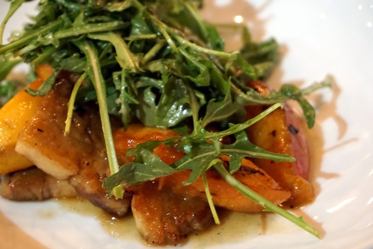 Brazen's seasonal salad incorporates peaches, pork belly, and arugula. - VERONICA PENNEY