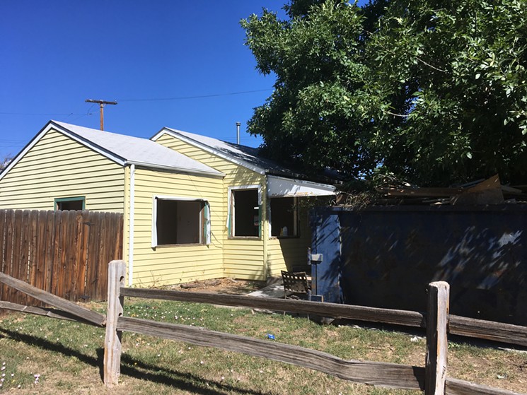 The home of a south Denver dog hoarder is being gutted. - MARK ANTONATION