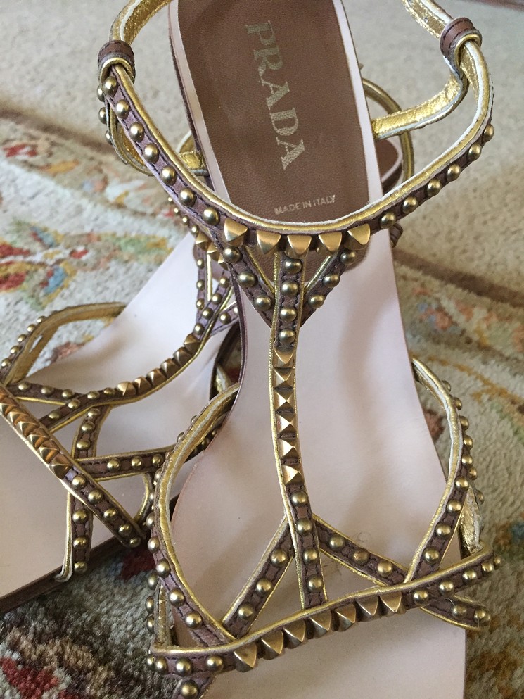 Strappy Prada sandals: All that glitters is (bargain couture) gold. - COURTESY ARC