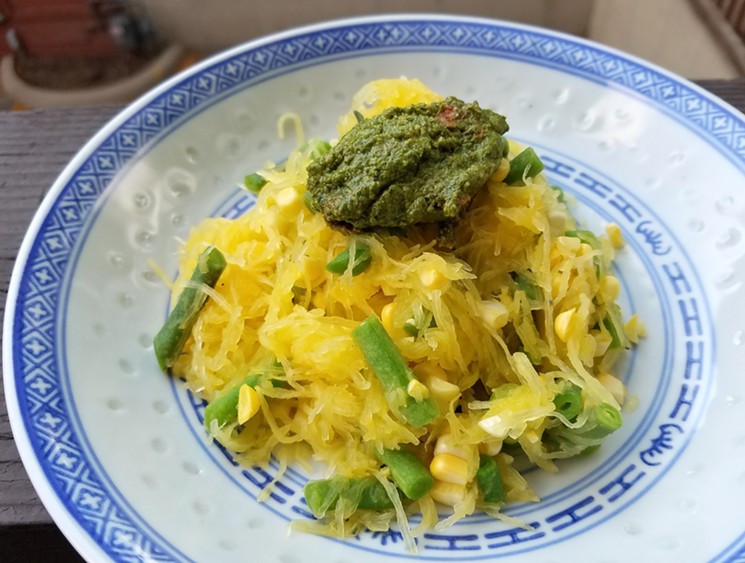 Ta-da! I made a light succotash with roasted spaghetti squash, beans, a little bit of butter, salt and some raw sweet corn. Then, to tie it all together, it got a dollop of pesto on top. - LINNEA COVINGTON