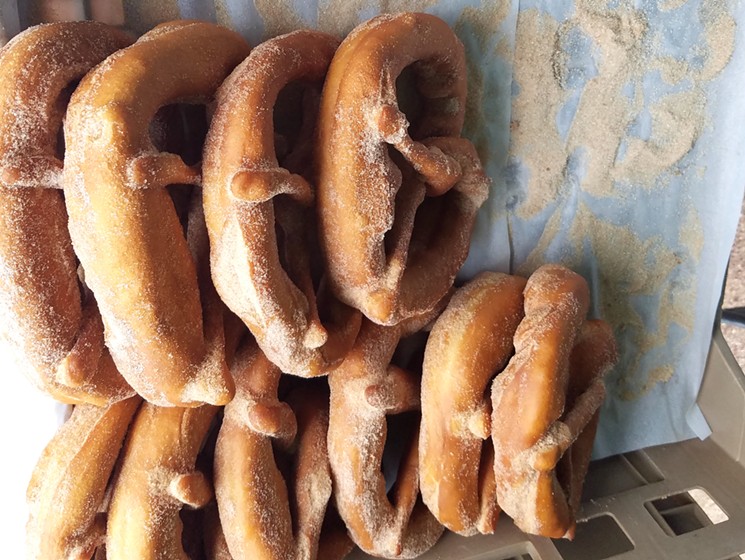 This farmers' market visit involved a hungry toddler who demanded one of the giant cinnamon pretzels from Styria Bakery. - LINNEA COVINGTON