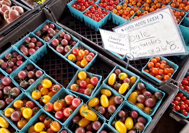 Aspen Moon Farms' colorful display of cherry tomatoes. - LINNEA COVINGTON