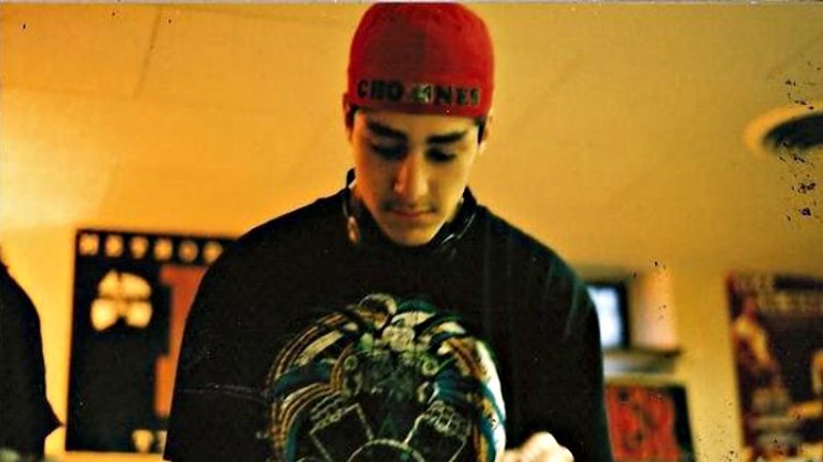 Portrait of a DJ as a young man. Chonz circa the mid-1990s; note the different spelling of his name on his hat. - COURTESY OF DJ CHONZ