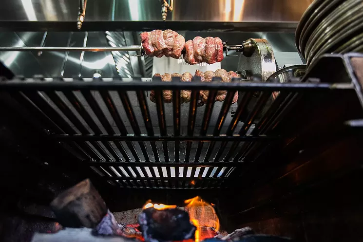 Mister Tuna is one of a growing number of Denver restaurants adding the smoky flavor of cooking over wood. - DANIELLE LIRETTE