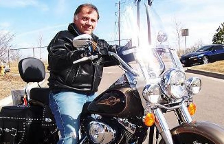 A vintage shot of Tom Tancredo astride his motorcycle. - TWITTER