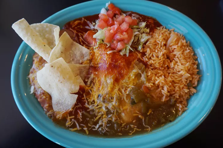 Little Anita's didn't invent Christmas, but the company has been serving enchiladas that way for more than forty years. - MARK ANTONATION