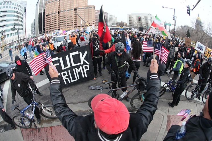 Inauguration Day protesters clash with Trump supporters and march in Denver on January 20. - BRANDON MARSHALL