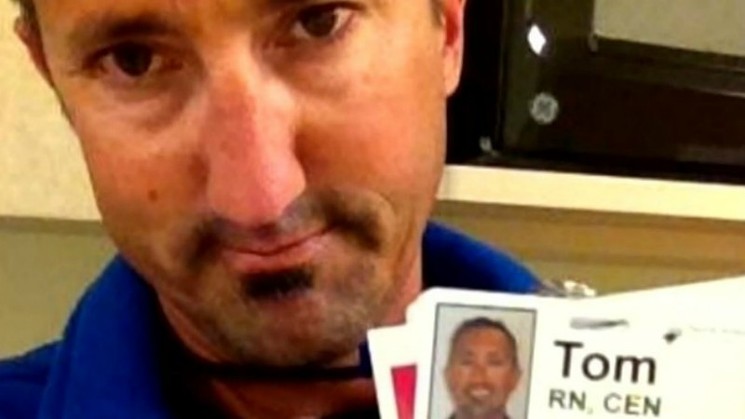 Tom Moore showing off his nurse's identification card. - CBS4 FILE PHOTO