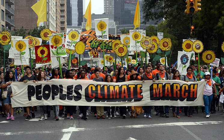 Xiuhtezcatl Martinez on the front lines of a climate march in New York City in 2014. - COURTESY OF XIUHTEZCATL MARTINEZ