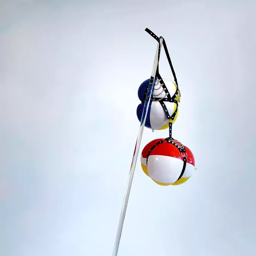 Sarah Bowling, "wingset (no swing or slide)," concrete, acrylic rod, beach balls, leather harness. - SARAH BOWLING