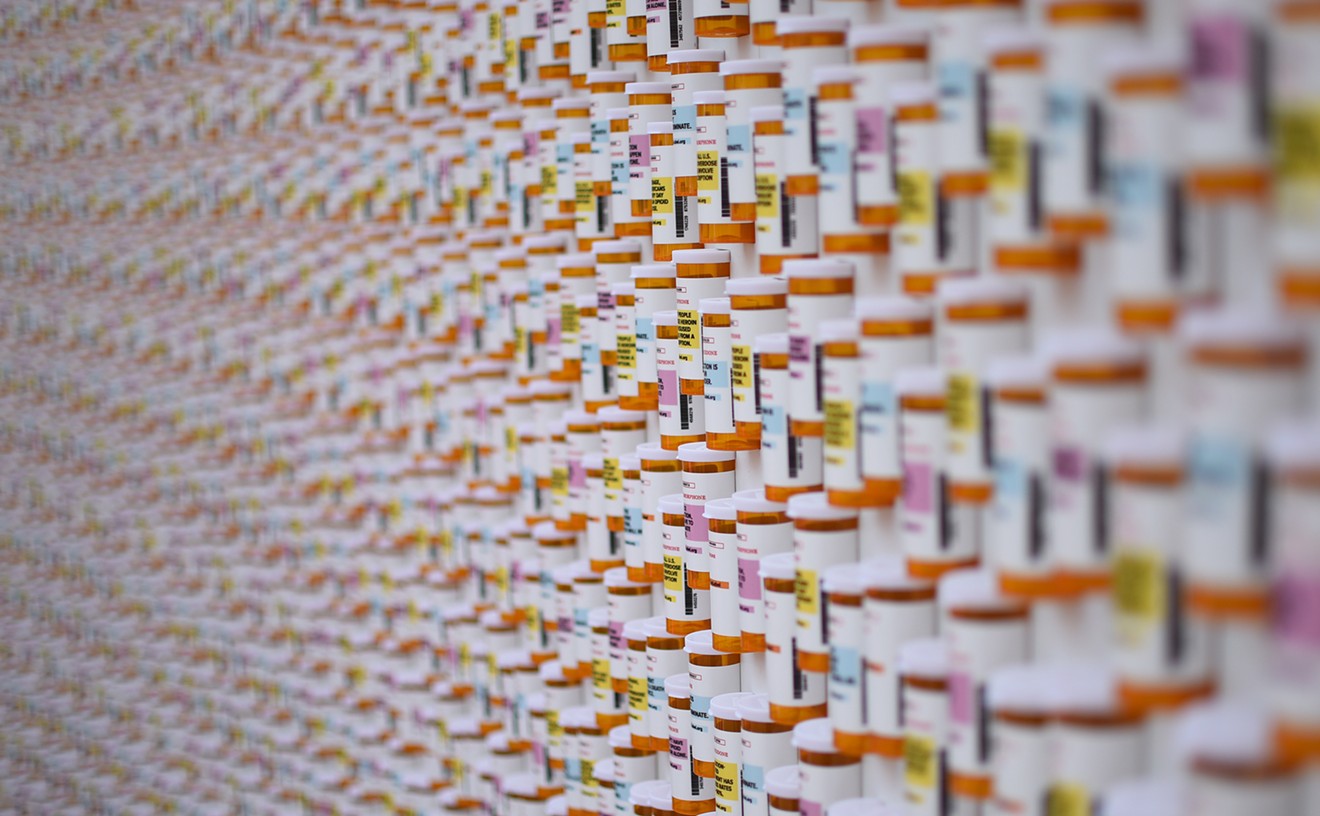The Colorado Department of Human Services unveiled a memorial wall made of 4,200 prescription bottles at Civic Center Park on Monday, May 14.