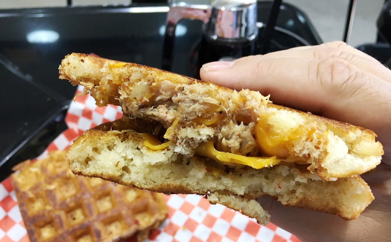 A pullled-pork and cheddar waffle sandwich at the Waffle Place.