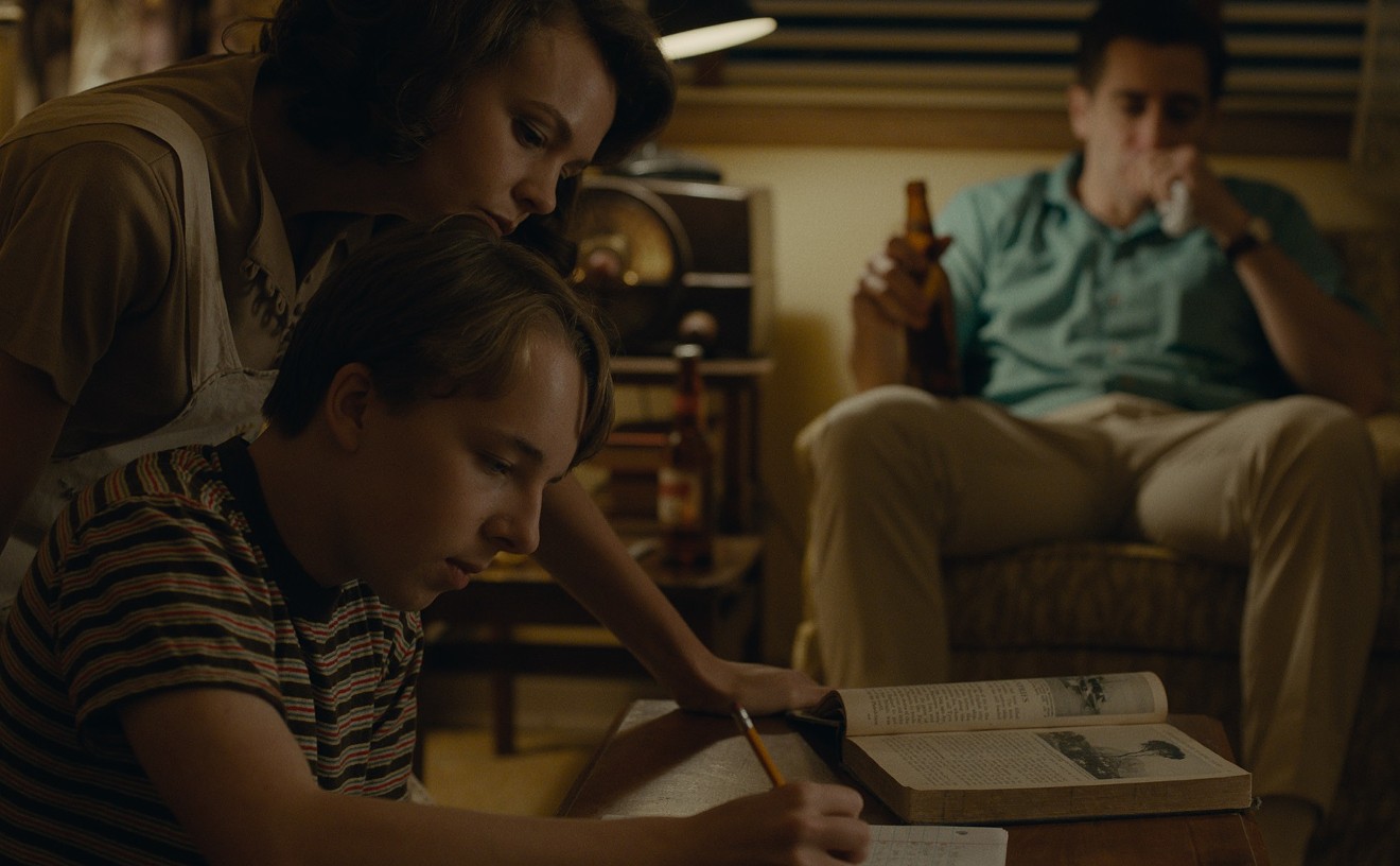 Carey Mulligan (left) plays Jeanette, a wife and mother recklessly searching for change while raising her son, Joe (Ed Oxenbould), in the domestic drama Wildlife, the directorial debut of actor Paul Dano.