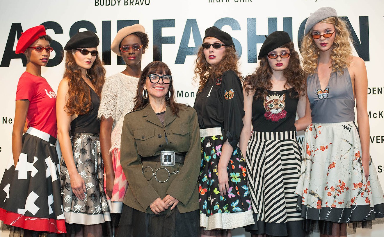 Designer Mona Lucero and her models pose for pictures during Massif Fashion Week.