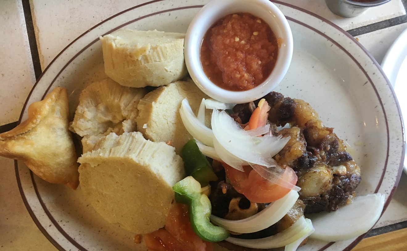 Kenkey is lightly fermented and steamed cornmeal from West Africa, here served with braised oxtail.