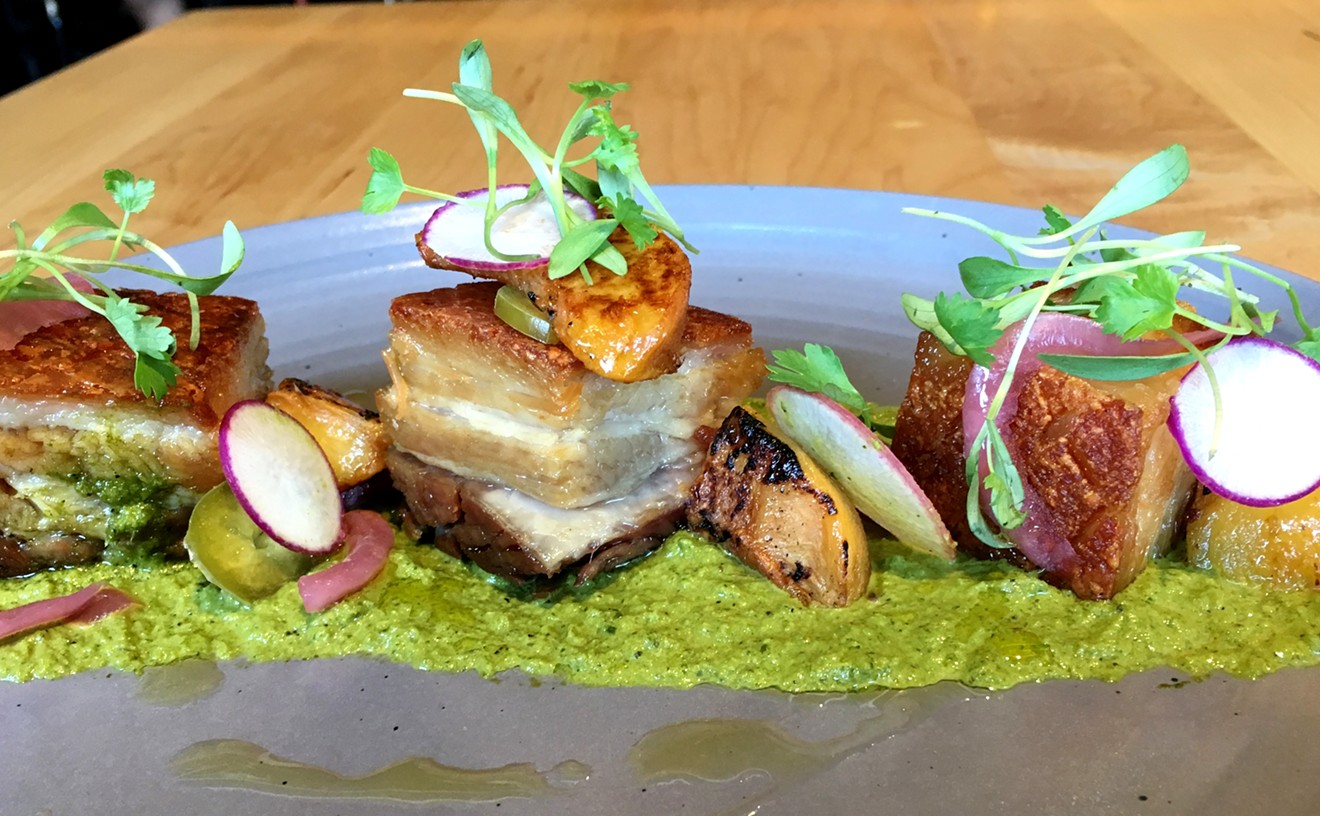 Pork and peach is a combo chef Brent Turnipseede hopes to keep on his menu in various forms, as in this pork belly with charred salsa verde and grilled peaches.