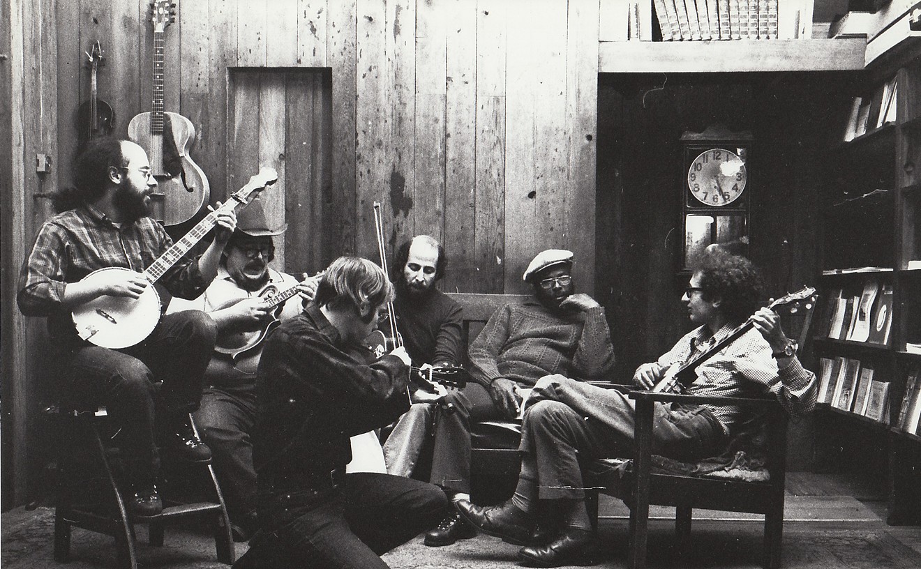 A late-’60s photo of the Denver Folklore Center. Left to right: Steve Weincrot, David Ferretta (mandolin), Larry Sandburg, Harry Tuft, Wesley Westbrooks, and Dick Weissman.