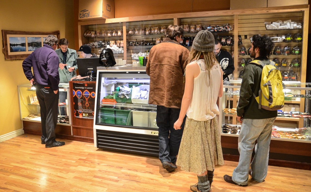 Customers wait in line at a Terrapin Care Station dispensary.