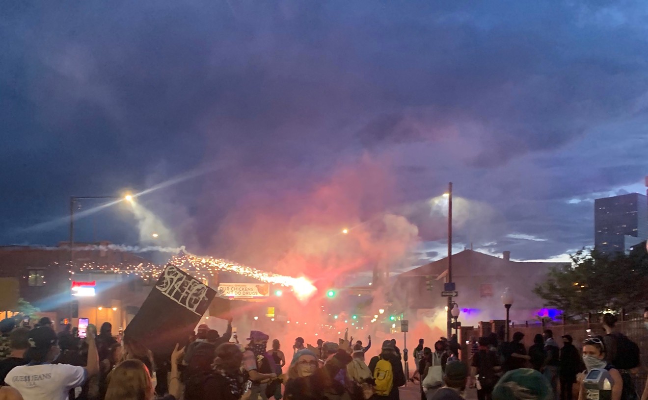 Photo of tear gas and fireworks captured by a protester on May 31 at the corner of  Emerson and Colfax.