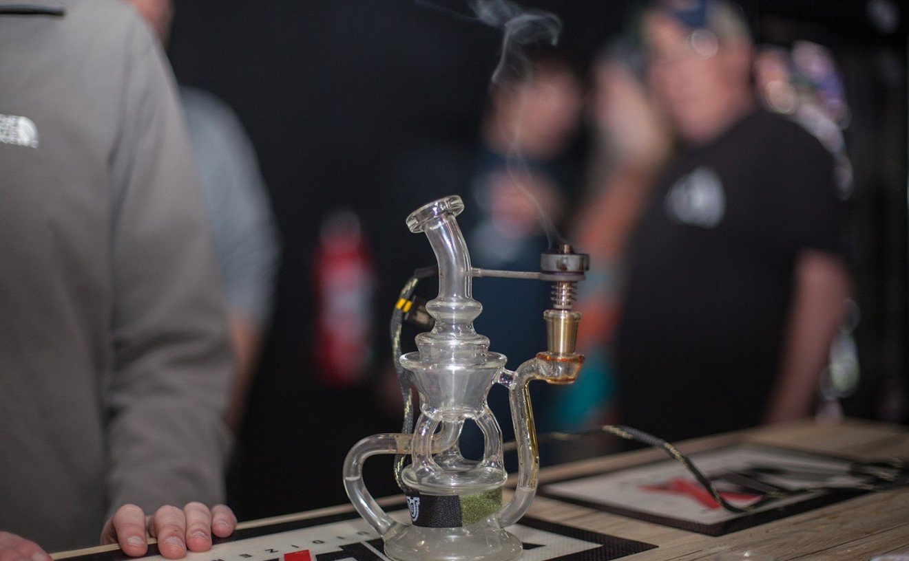 A dab ring burns inside the Honey Pot Lounge, a now-closed marijuana social consumption lounge in Denver.