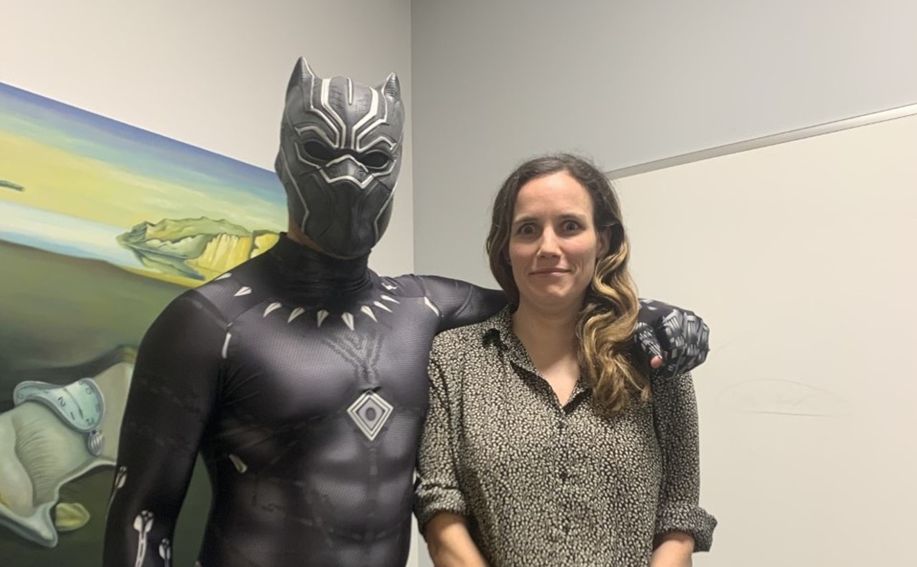 Tattered Cover CEO Kwame Spearman as Black Panther (left).