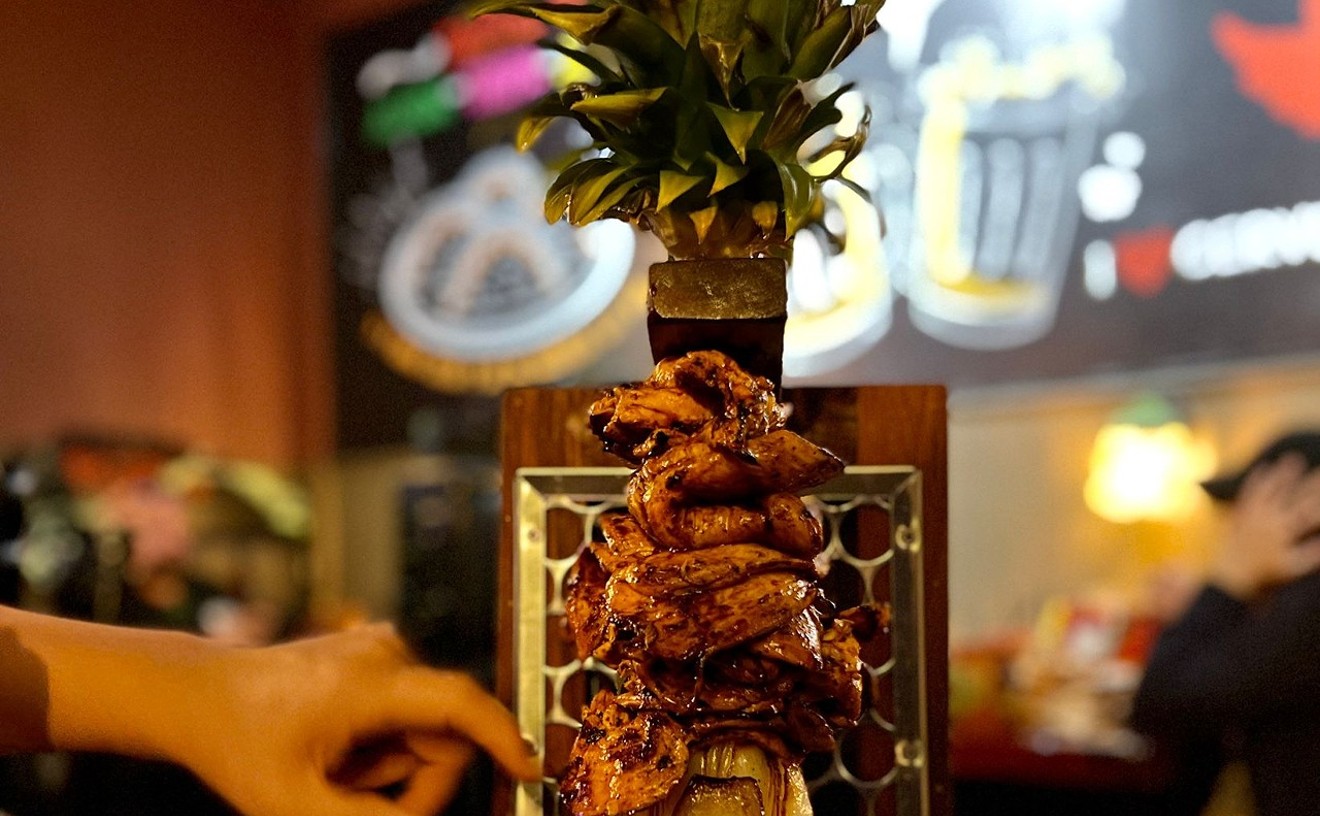 The tabletop al pastor tower at Wings & Burgers.