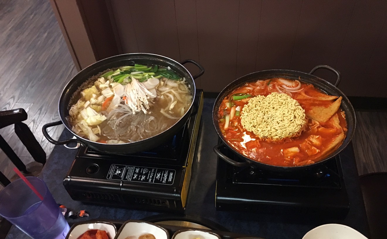 The bulgogi and octopus stew (left) and stir-fried rice cakes are both good orders at Shin Myung Gwan.