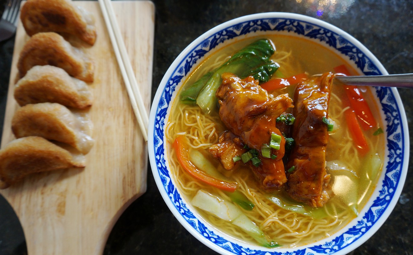 Egg-noodle soup with pork ribs and a side of beef-filled dumplings.