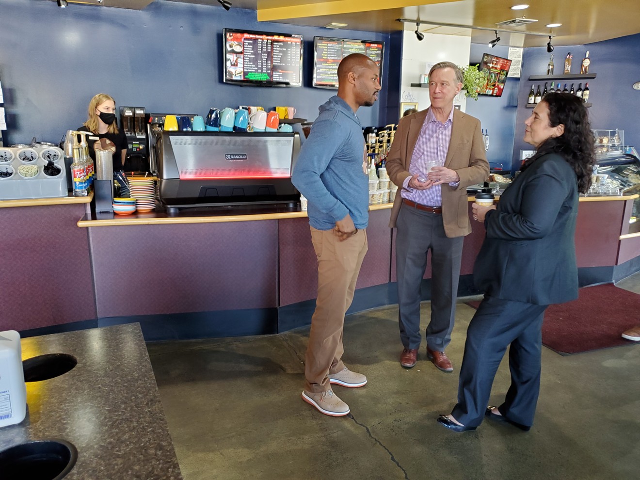 Isabella Guzman (right) visits Coffee at the Point owner Ryan Cobbins (left) with Senator John Hickenlooper on her first trip outside Washington, D.C., as SBA Administrator.