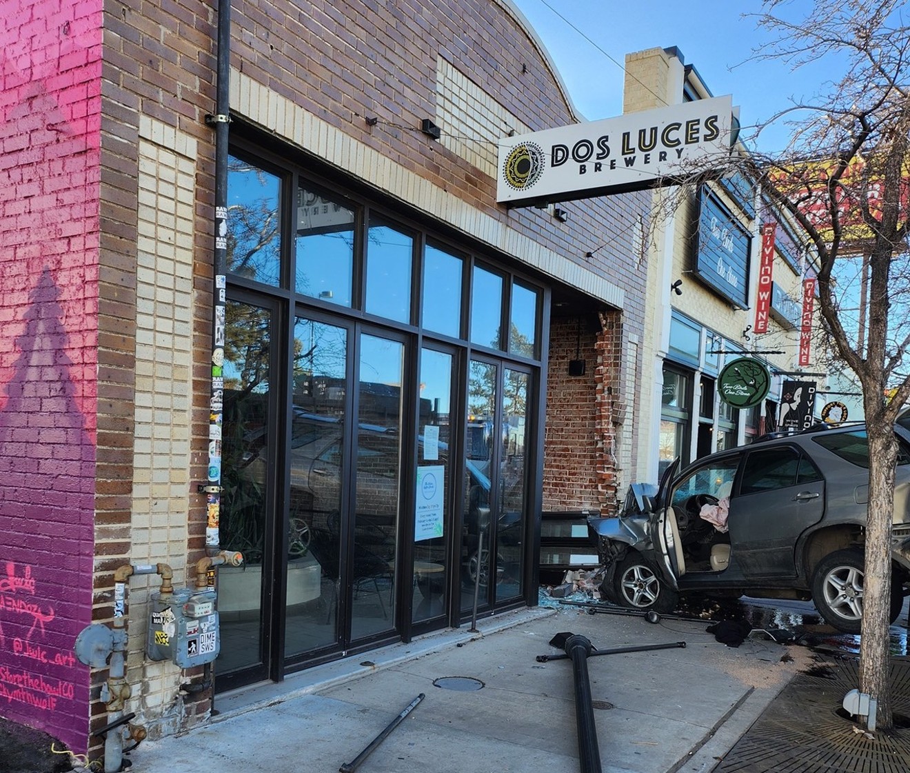 A car crashed into the front of Dos Luces early on Tuesday, February 21.