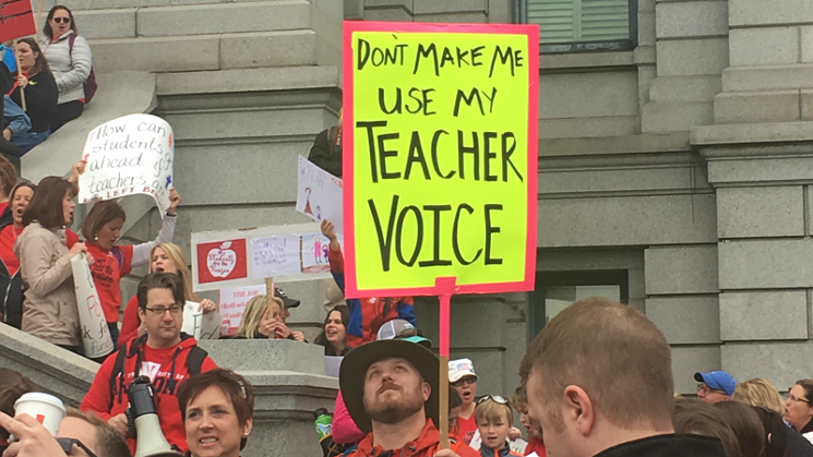 One of the protesters at a teacher demonstration at the Colorado State Capitol on April 26.
