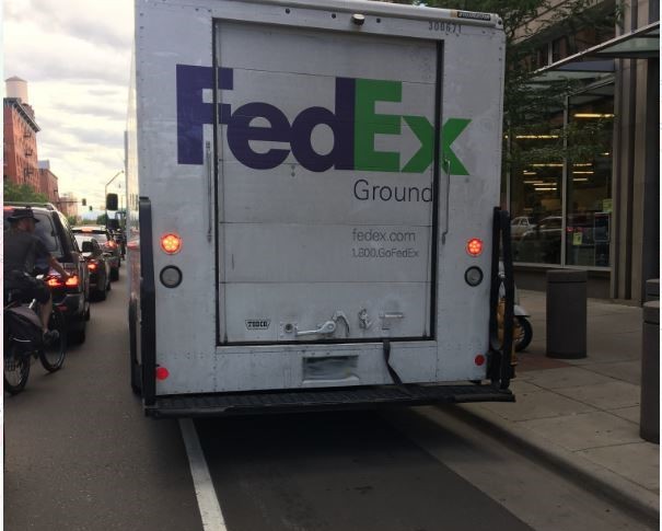A recent, user-submitted photo of a FedEx truck blocking a downtown bike lane