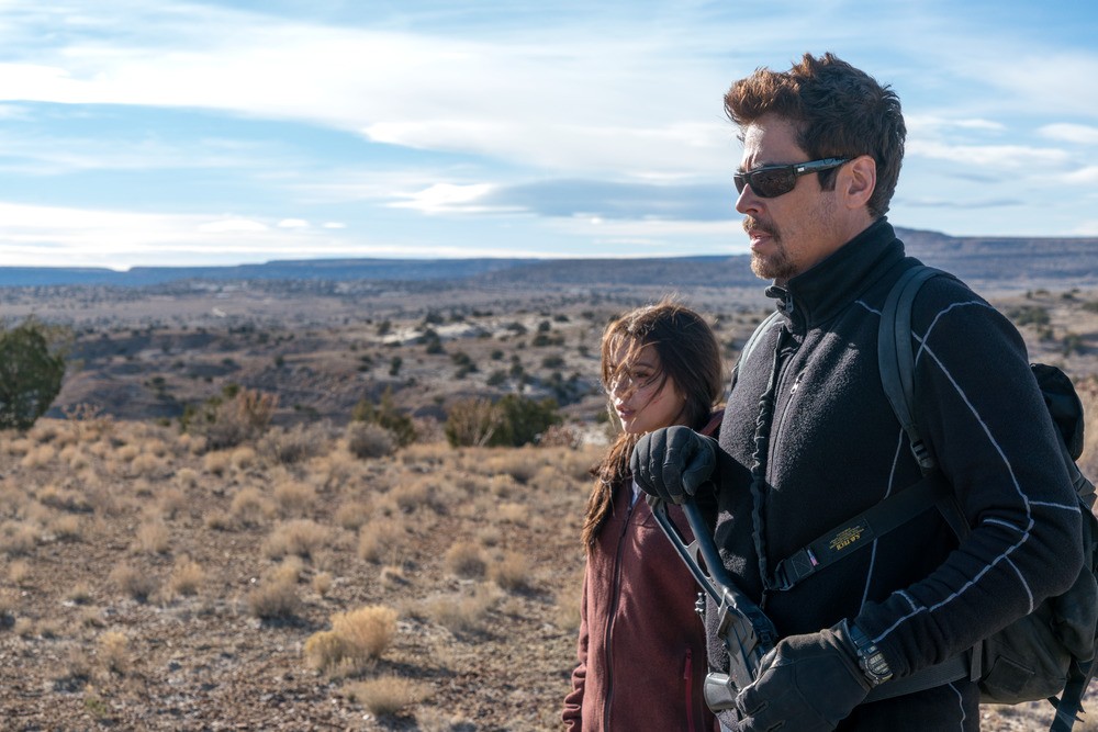 Rogue recruit Alejandro (Benicio Del Toro, right) kidnaps  sixteen-year-old Isabel Reyes (Isabela Moner), but the two somehow manage to form a mutual respect in the Mexican desert during Stefano Sollima’s Sicario: Day of the Soldado.