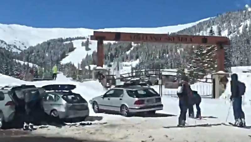 A screen capture from a Twitter video by @officialsnowdog showing crowds of skiers gathering at Loveland Pass last weekend.