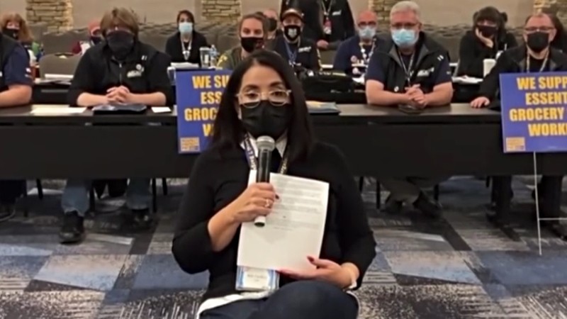 Local 7 president Kim Cordova, foreground, as seen during a video offering an update on negotiations with King Soopers on January 14.