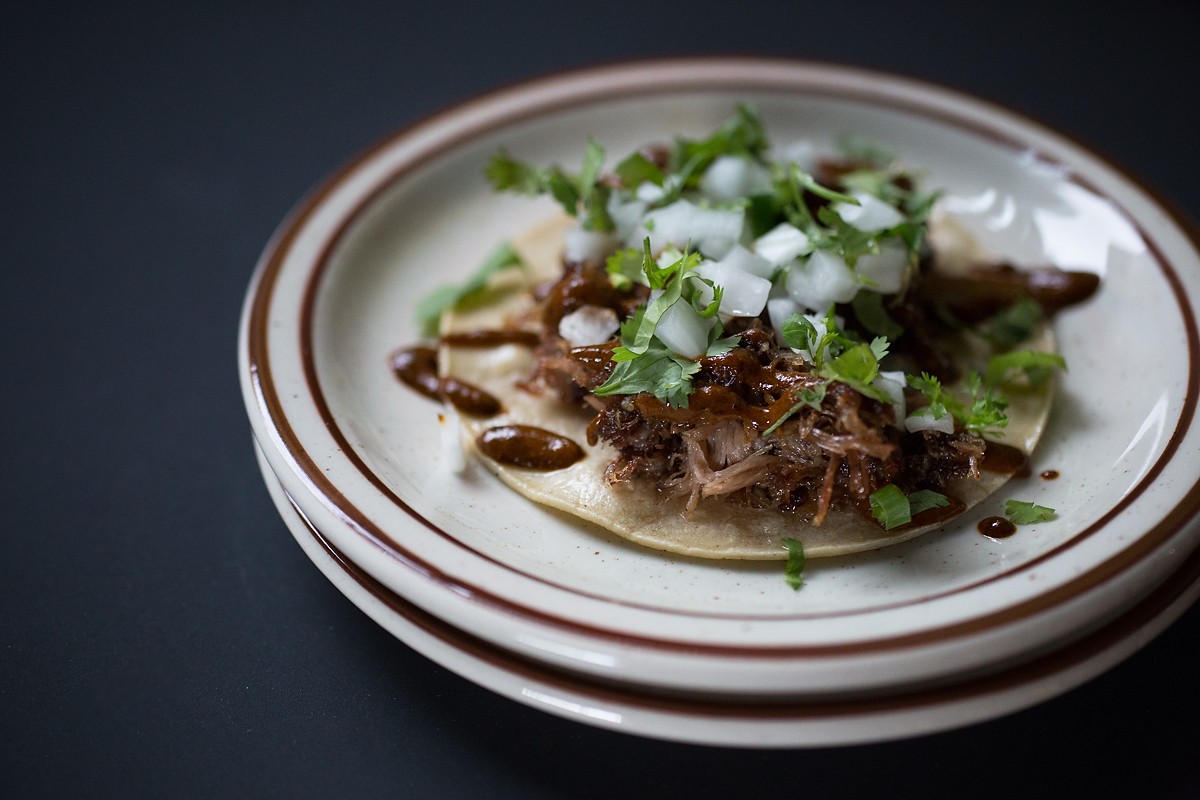 Lamb neck taco with onion, cilantro and chile pasilla-lime at Los Chingones Stapleton, which opened this month.