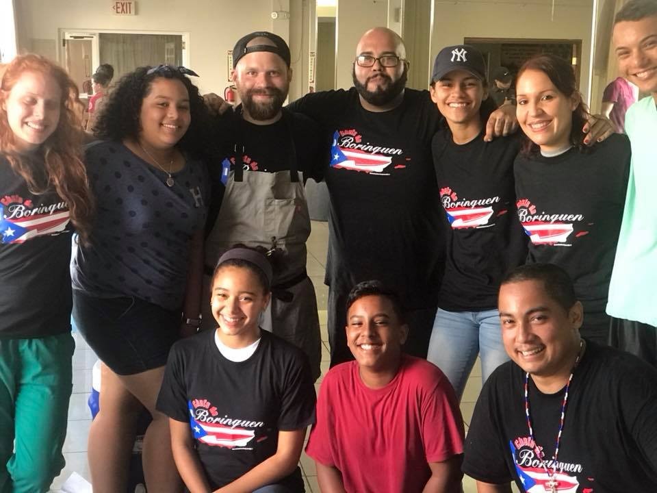 Chef Jesse Vega (in backwards cap) was one of several chefs who traveled to Puerto Rico to provide hot meals in areas recovering from Hurricane Maria.