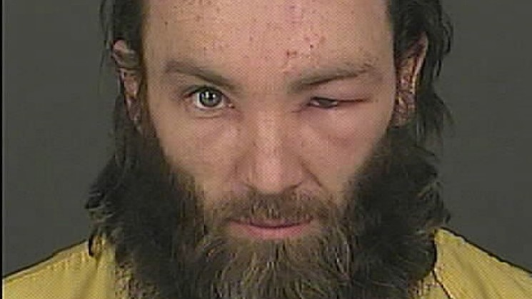 Denver District Attorney Beth McCann said the swelling around Joshua Cummings's eye, as seen in his booking photo, was caused by "some kind of infection" rather than an injury sustained during his arrest.