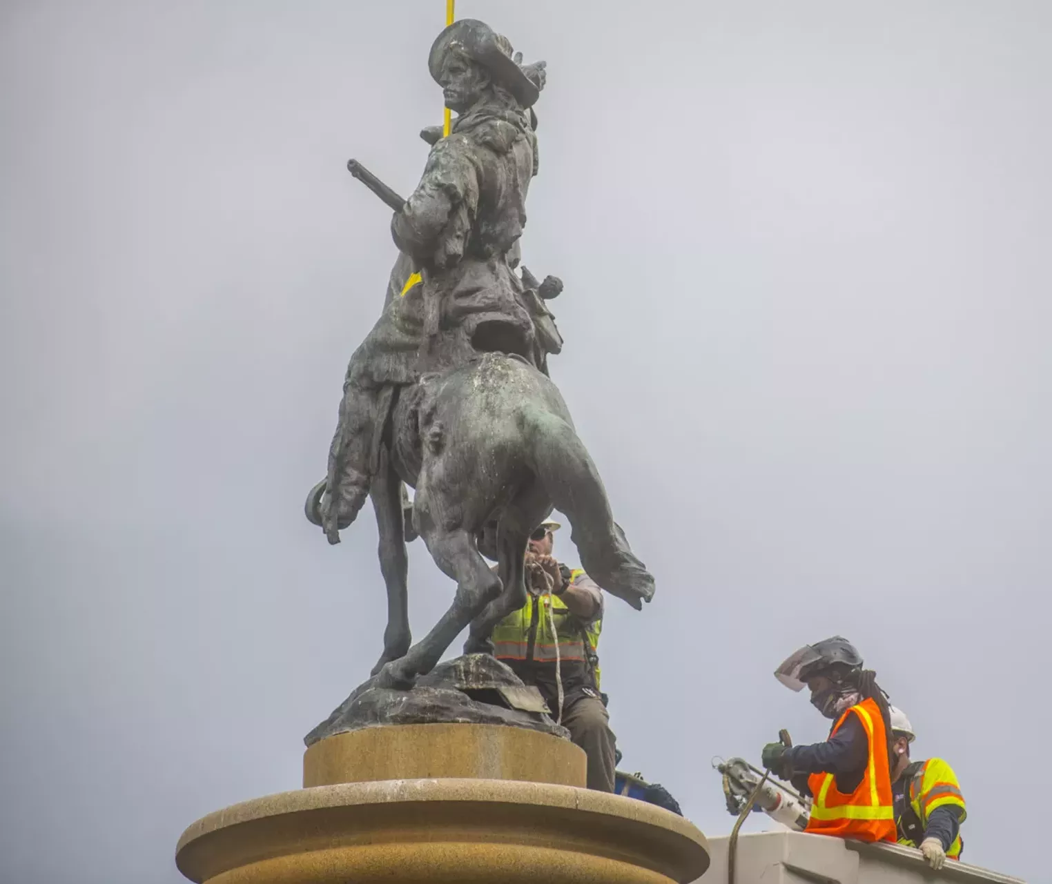 Photos Denver Crews Remove Kit Carson From "Pioneer Monument" Westword
