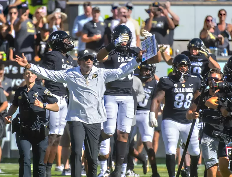 Image: Deion sanders coaches football on sidelines