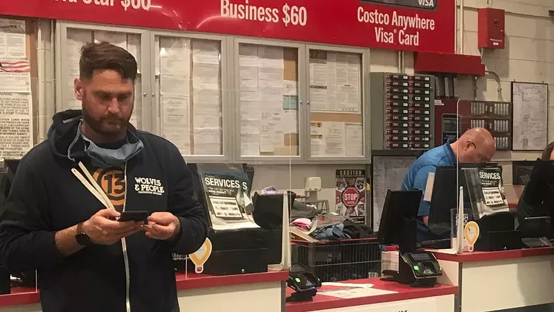 Image: A sizable percentage of customers and employees went mask-free at Costco, which is allowing vaccinated people to skip facial coverings.