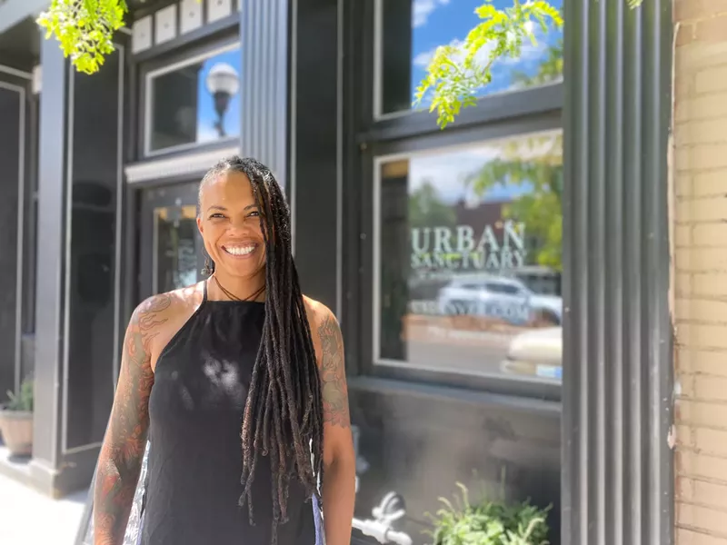 Image: Ali Duncan, owner of Urban Sanctuary, outside of the Welton Street building she just purchased.