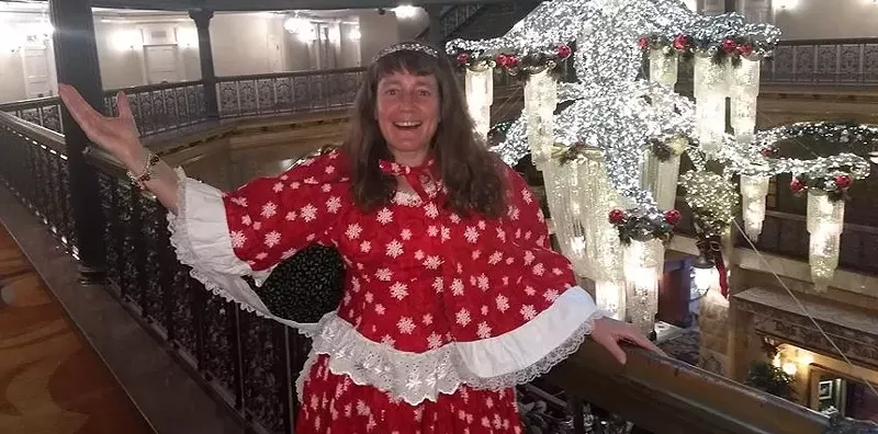 Image: North Pole Poet Laureate Amy Marschak is decked out for the holidays, as is the Brown Palace.