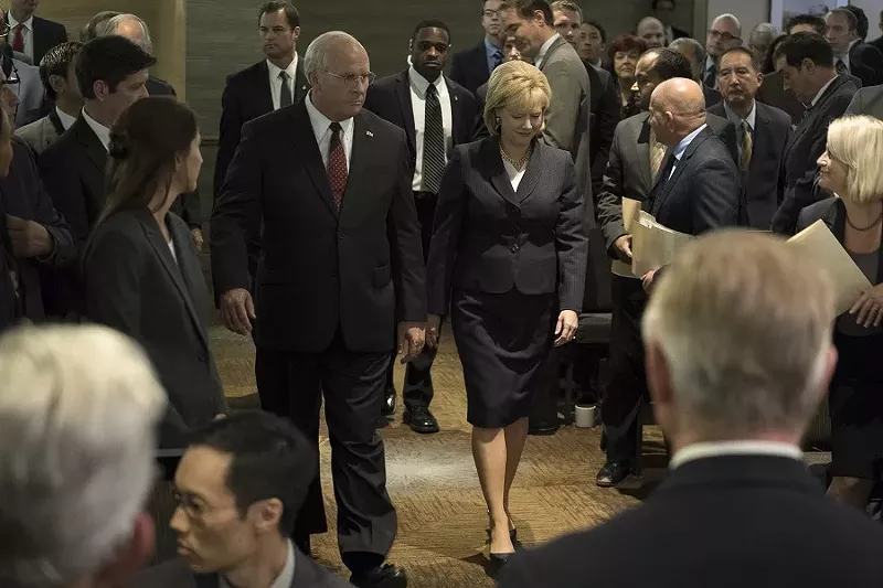 Image: Christian Bale (left) plays Dick Cheney, accompanied by his wife, Lynne (Amy Adams), in a scene from Vice, Adam McKay’s film about the former vice president who seemed content to serve as the dark lord of George W. Bush's administration.
