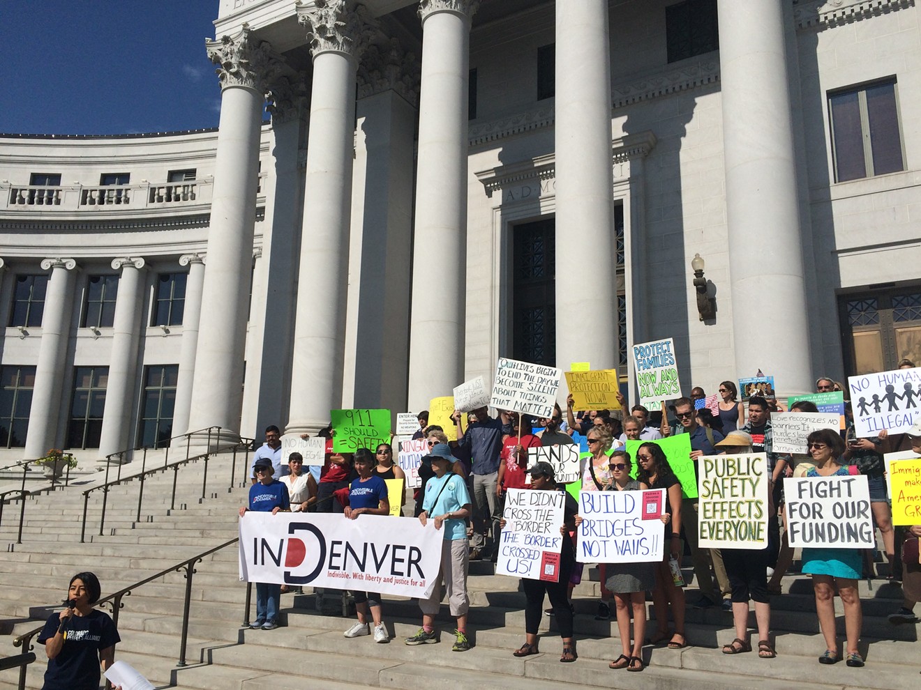 Immigration activists gathered today, August 2, at the Denver City and County Building to show their support for the proposed sanctuary city law.