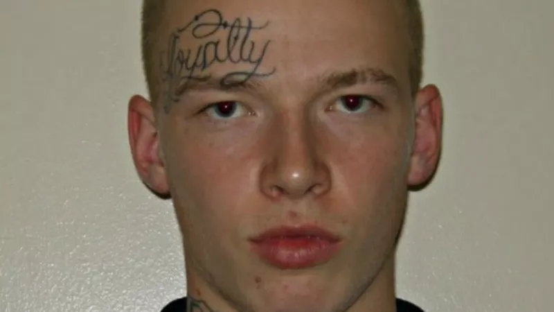Image: A booking photo of Quinn Scaggs.