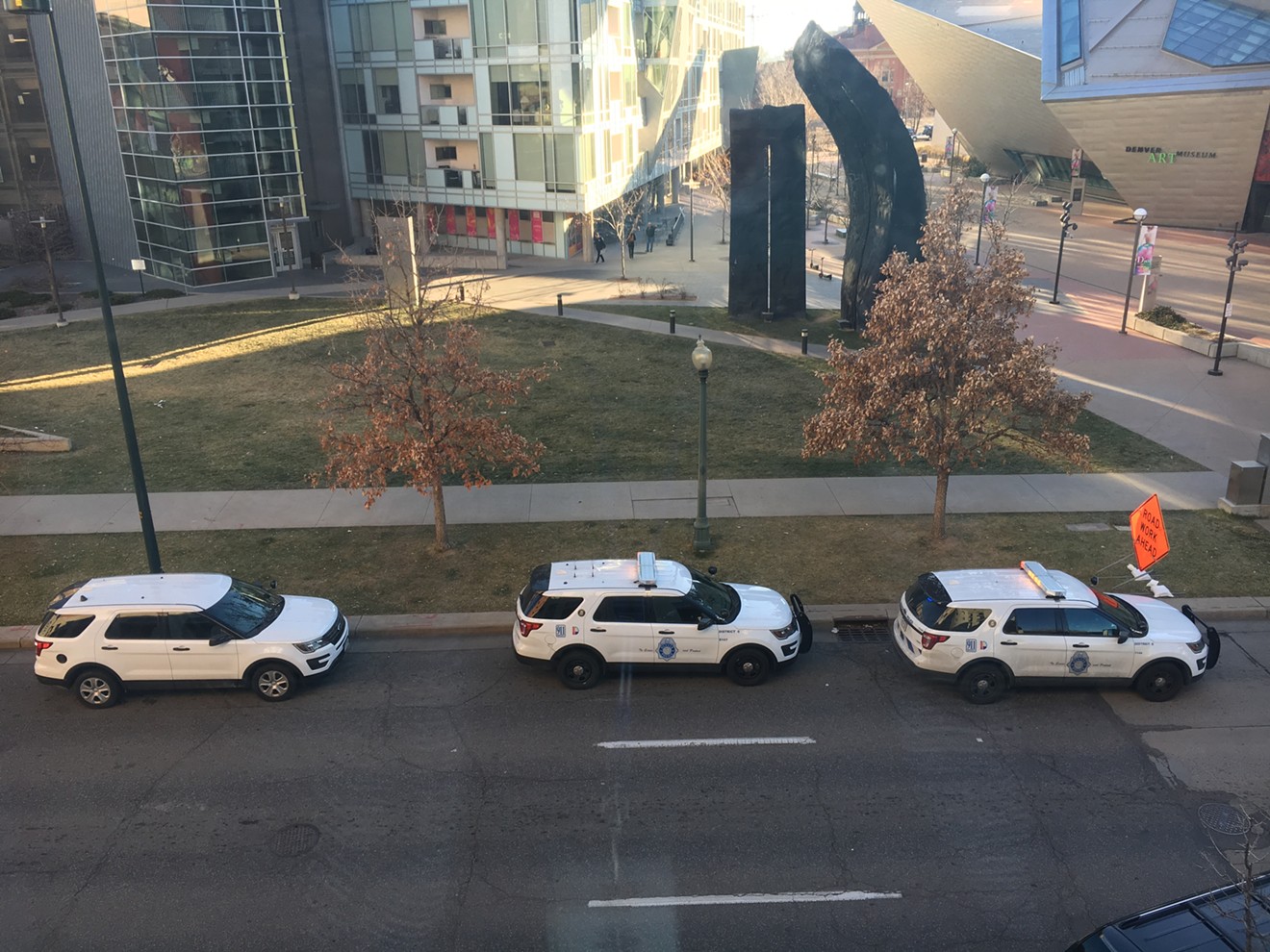 Police parked outside the Denver Art Museum on Sunday afternoon.