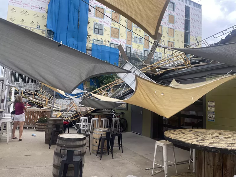 Image: a patio with damage from fallen scaffolding