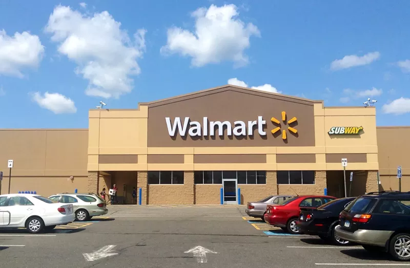 Image: A Walmart in Aurora reopened after the deaths of an employee and security guard led officials to order its temporary closure.